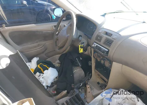 1998 Toyota Corolla Ce z USA, uszkodzony, nr VIN 2T1BR12E8WC096634